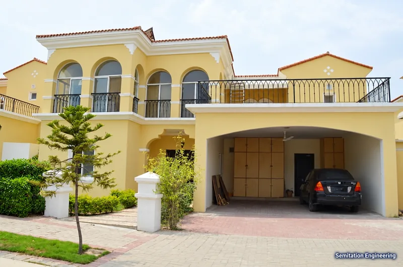 Villa entrance, balcony and planted frontage in Islamabad