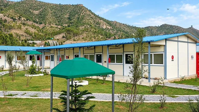 Camp building and landscaped shared space