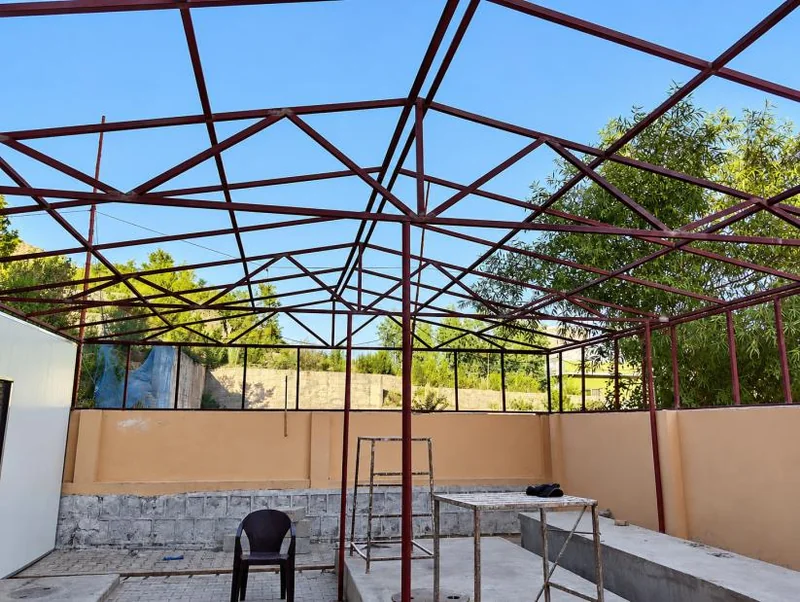 Pitched steel frame before roof sheeting
